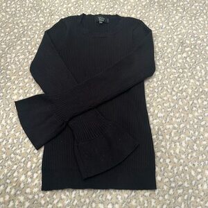 Women’s black stretchy sweater top with bell sleeves, size medium